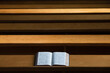 © Designpics - A bible open on a wooden bench; Northumberland england
