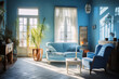 A shabby chic bright blue living room is lit with sun beams coming in from the left without people present
