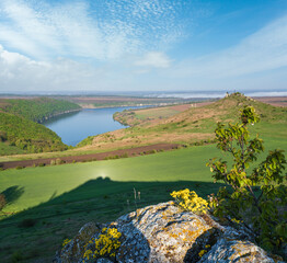 Wall Mural - Amazing spring view on the Dnister River Canyon with picturesque rocks, fields, flowers. This place named Shyshkovi Gorby,  Nahoriany, Chernivtsi region, Ukraine.