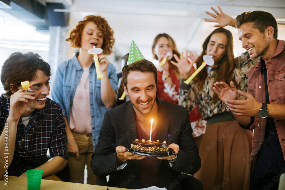 Young and diverse group of people celebrating a surprise birthday party ...