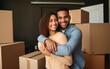 © piai - Young man and woman apartment buyers celebrating relocation, removal, mortgage, new house purchase concept. Generative AI