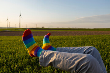 Mans legs with rainbow socks