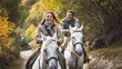 couple riding horses outdoor 