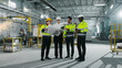 © ihorvsn - Group of industrial heavy engineers wearing in protective helmets and yellow vests walking at background of workprocess. Multicultural employees working and cooperate at construction site.