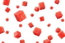 Falling Watermelon Cubes Isolated On White Background, Selective Focus
