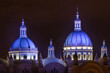 Illuminated domes of the New Cathedral, Cuenca, Ecuador.