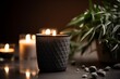 mockup packaging vela negra de lujo, vela de cerámica negra y oro, vela encendida en un spa, sesión de masajes con aromaterapia 