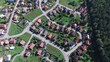 © maradek - Aerial View Of Residential Neighborhood and Houses in Summer