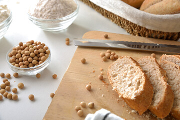 Wall Mural - Sliced soy bread on cutting board on kitchen bench