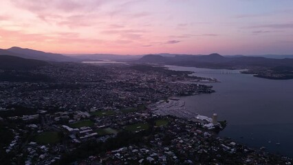 Sticker - Hobart, Australia: Aerial drone footage of a cinematic sunset over the Hobart city in Tasmania main city in Australia. 