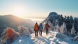 Sentimental couple of sightseers dressed in warm winter sportswear with visitor rucksacks strolling with trekking posts within the blanketed pine mountains in an extraordinary dusk Family rest