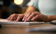 © Talia Mdlungu/peopleimages.com - Hands, keyboard and a business person typing in an office closeup at night for overtime project management. Computer, email and desk with an employee working on a report or assignment in the evening