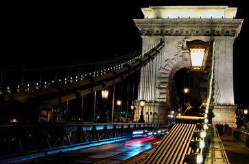 Wall Mural - Picturesque view of ancient illuminated Chain Bridge over Danube river. Notable landmark of Budapest. Travel and tourism concept