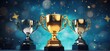 Gold trophy cup on blue abstract background