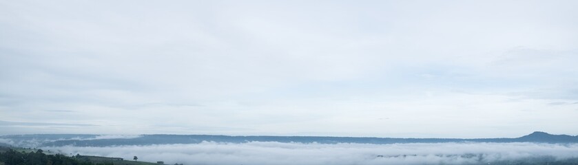 Wall Mural - panoramic of foggy at morning, mountains top view of sunrise landscape in the rainforest, thailand.