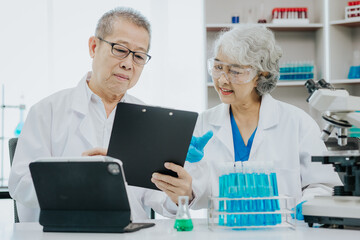 Wall Mural - Modern medical laboratory: two scientists work with micropipettes Analyze biochemical samples Advanced Medical Science Laboratory