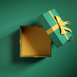 Top view of open gift box or present box with gold ribbon and bow  on green background with shadow