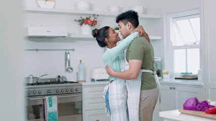 Wall Mural - Love, food and couple dance in a kitchen while cooking, bond and having fun in their home together. Brunch, salad and man with woman hug, dancing and smile while preparing healthy meal in a house