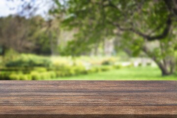 Sticker - Empty blank wood table on nature background.