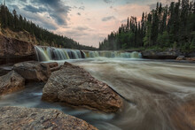 The Trout River Flows Over Sambaa Deh Falls In Sambaa Deh Territorial Park; Northwest Territories, Canada