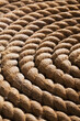 © Designpics - Close Up Of Thick Rope Wrapped In A Circle; Whitehorse, Yukon, Canada