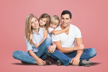 Wall Mural - Happy young parents with child posing