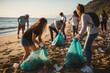 © thejokercze - Group of eco volunteers picking up plastic trash on the beach