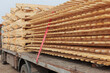 Stack of wooden pallet. Industrial wood pallet at factory warehouse. Cargo and shipping concept. Sustainability of supply chains.Eco-friendly nature and sustainable properties. Renewable wood pallet.