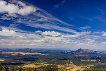 Wall Mural - Cinder cones and high clouds to the west of Humphreys Peak near Flagstaff Arizona