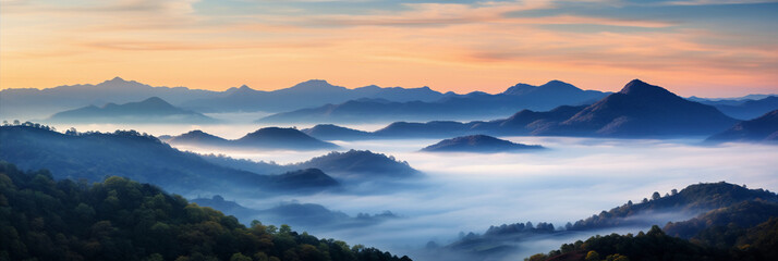 Canvas Print - panorama, sun rising over a mountain range, valleys filled with mist, vibrant sky transitioning from