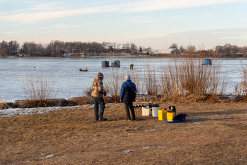 Wall Mural - Ice Fishing In January On Fox River In De Pere, Wisconsin