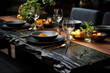 Holiday place setting with black stone plates on trunk designed solid wood dining table  