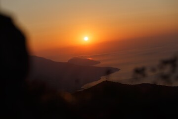 Canvas Print - Beautiful mountain landscape with sunset sky with sea