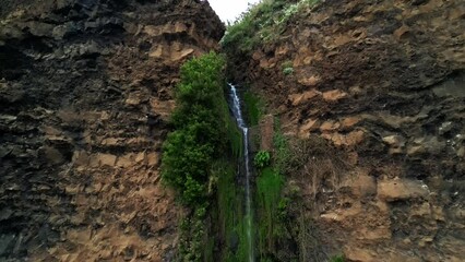 Wall Mural - Stunning footage of Cascata dos Anjos Waterfon in the evening