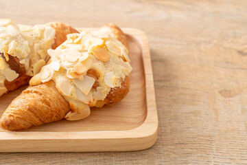 Wall Mural - croissant with cream and almonds