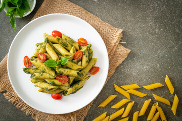 Canvas Print - penne pasta with pesto sauce and tomatoes