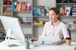 © BillionPhotos.com - Business woman working in office. Watching webinar. Online consultant concept.