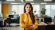 © PRASANNAPIX - successful female corporate employee standing at office