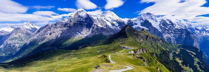 Poster - Swiss nature scenery. Scenic snowy Alps mountains Beauty in nature. Switzerland landscape. View of Mannlichen mountain and famous hiking route 