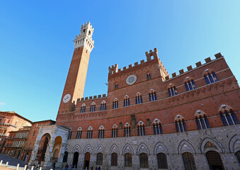 Wall Mural - Siena, SI, Italy - February 20, 2023: Town Hall called PALAZZO PUBBLICO and TORRE DEL MANGIA Tower