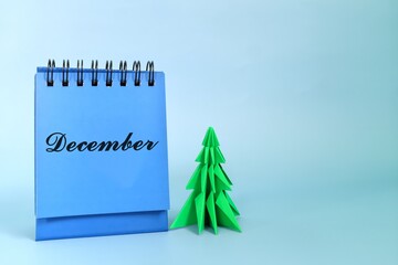 Wall Mural - Selective focus of December calendar with Christmas tree decoration. Hello Christmas season concept.