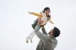 © Wesley JvR/peopleimages.com - Airplane, sky background mockup or child playing with father to relax or bond with love or care, Smile, outdoor flying space or excited Indian dad with a kid to enjoy fun games on a holiday together