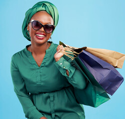 Sticker - Studio bag, shopping and happy customer, black woman or client excited for holiday fashion spree, sales or mall market deal. Financial freedom, retail loan and rich African person on blue background