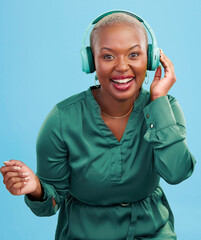 Poster - Dance music, portrait or happy black woman have fun, smile and listening to podcast, radio network or song. Happiness, studio or African dancer streaming audio, headphones or sound on blue background