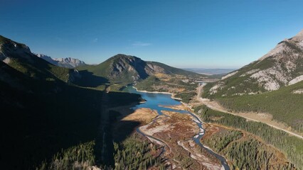 Wall Mural - drone view of a forest, rivers and mountains in the rocky mountains. landscape from the air. video f