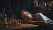 © Sasint - Alcohol addicted woman sleeping at the table