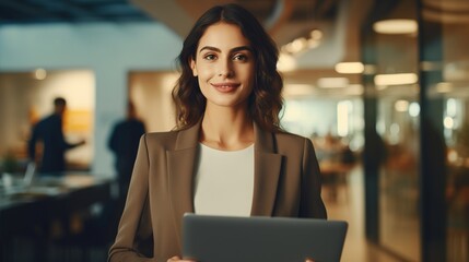 Canvas Print - woman working on laptop looking at camera in office. generative ai