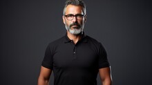 Studio Of A Serious Bearded Man In A Black Polo Shirt. From The Waist Up, On A White Background. With Short Hair And Spectacles. Generative Ai