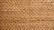 Woven straw mat texture background, presenting a natural, rustic aesthetic with intricate interlocking fibers. Great for eco-friendly product packaging and interior decor.