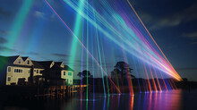 A neighborhood with a vibrant laser display attraction